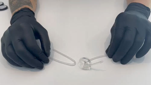 Instruktioner för Byte av genomdragen slang